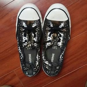 Black and gold Converse